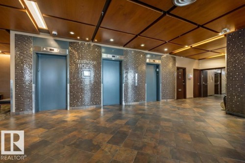 Common area with wooden ceiling and recessed lighting - 1401 10883 Saskatchewan Drive, Edmonton, AB - Indoor Photo Showing Other Room