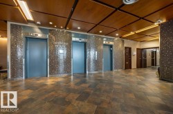 Common area with wooden ceiling and recessed lighting - 