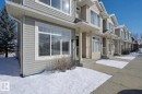 View of snow covered property entrance - 21 6032 38 Avenue, Edmonton, AB  - Outdoor With Facade 