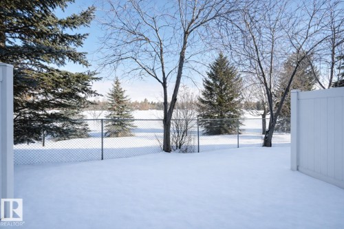 View of yard layered in snow - 21 6032 38 Avenue, Edmonton, AB - Outdoor