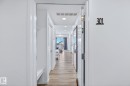Hallway featuring recessed lighting and light wood-style flooring - 301 864 Secord Boulevard, Edmonton, AB  - Indoor Photo Showing Other Room 
