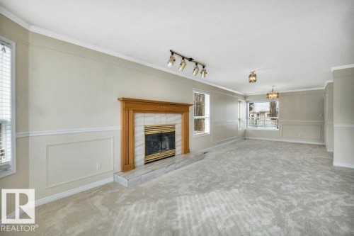 20 Alphonse Crest, St. Albert, AB - Indoor Photo Showing Living Room With Fireplace