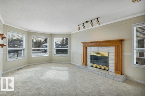 20 Alphonse Crest, St. Albert, AB - Indoor Photo Showing Living Room With Fireplace