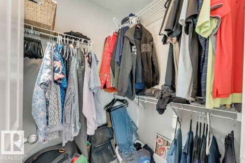 View of walk in closet - 1323 South Creek Link, Stony Plain, AB - Indoor With Storage