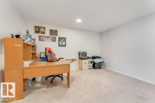 Office area with light colored carpet and recessed lighting - 1323 South Creek Link, Stony Plain, AB - Indoor Photo Showing Office