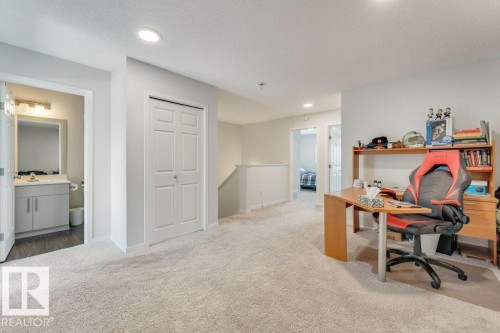 Office space featuring light colored carpet, recessed lighting, and a textured ceiling - 1323 South Creek Link, Stony Plain, AB - Indoor Photo Showing Office