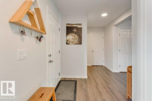 Corridor with light wood-style flooring and recessed lighting - 1323 South Creek Link, Stony Plain, AB - Indoor Photo Showing Other Room