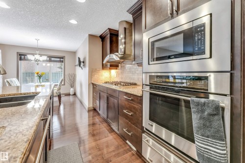 12063 21 Avenue Sw, Edmonton, AB - Indoor Photo Showing Kitchen With Stainless Steel Kitchen With Double Sink With Upgraded Kitchen