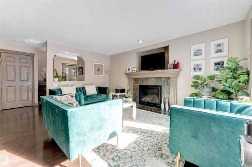12063 21 Avenue Sw, Edmonton, AB - Indoor Photo Showing Living Room With Fireplace
