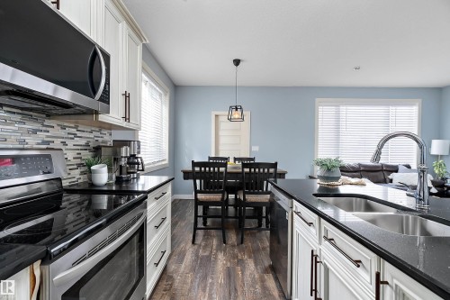 34 Spruce Boulevard, Leduc, AB - Indoor Photo Showing Kitchen With Double Sink With Upgraded Kitchen
