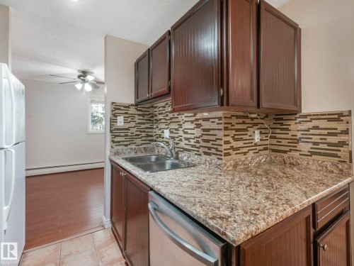 319 2323 119 Street, Edmonton, AB - Indoor Photo Showing Kitchen With Double Sink