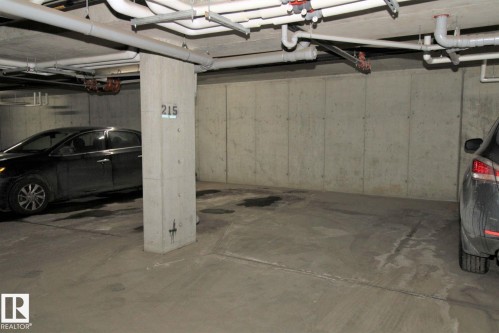 Garage with a parking garage - 430 5515 7 Avenue, Edmonton, AB - Indoor Photo Showing Garage
