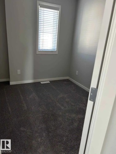 54 320 Secord Boulevard, Edmonton, AB - Indoor Photo Showing Other Room