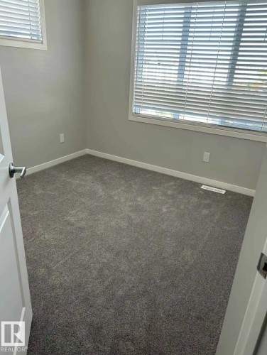 54 320 Secord Boulevard, Edmonton, AB - Indoor Photo Showing Other Room