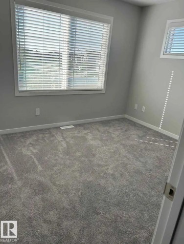 54 320 Secord Boulevard, Edmonton, AB - Indoor Photo Showing Other Room