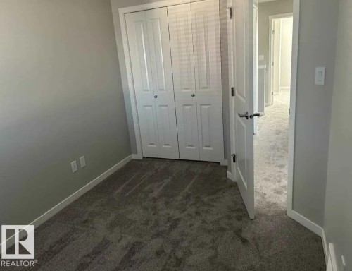 54 320 Secord Boulevard, Edmonton, AB - Indoor Photo Showing Other Room