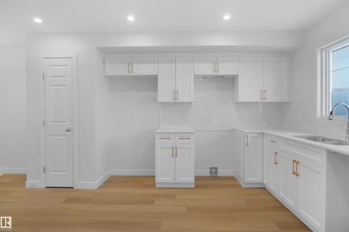 5137 River'S Edge Way, Edmonton, AB - Indoor Photo Showing Kitchen With Double Sink