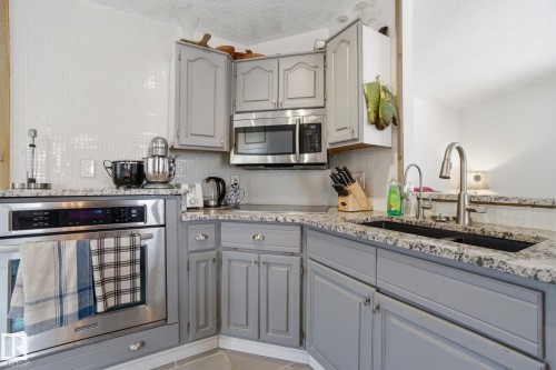 38 Laydon Drive, St. Albert, AB - Indoor Photo Showing Kitchen With Double Sink With Upgraded Kitchen