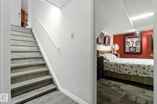 Stairway with baseboards and carpet - 39 Grand Meadow Crescent, Edmonton, AB - Indoor Photo Showing Other Room