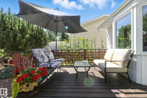 Wooden terrace with an outdoor lounge area - 39 Grand Meadow Crescent, Edmonton, AB - Outdoor With Deck Patio Veranda With Exterior
