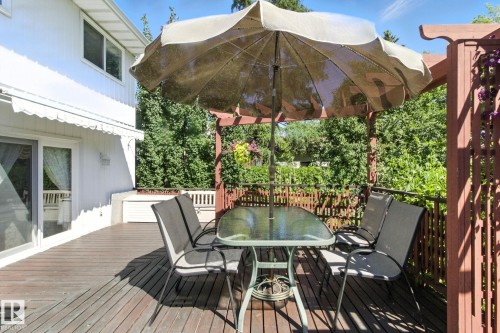 Deck with outdoor dining area - 39 Grand Meadow Crescent, Edmonton, AB - Outdoor With Deck Patio Veranda With Exterior