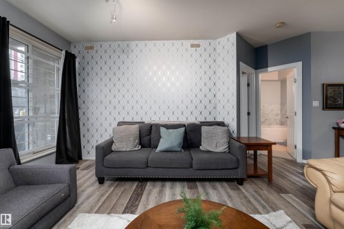 108 8619 111 Street, Edmonton, AB - Indoor Photo Showing Living Room