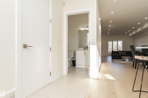 Corridor with recessed lighting and baseboards - 2 11569 University Avenue, Edmonton, AB - Indoor Photo Showing Other Room
