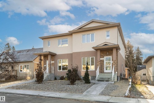 Traditional home featuring stucco siding - 2 11569 University Avenue, Edmonton, AB - Outdoor With Facade