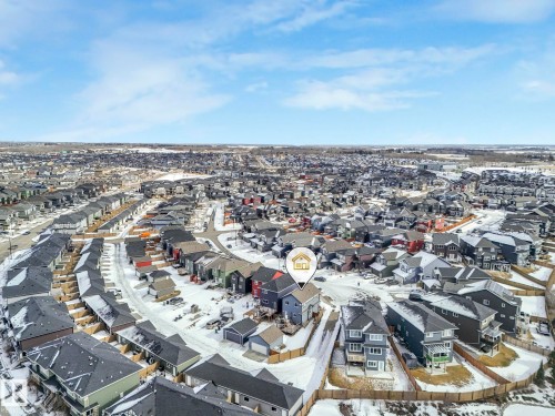 Aerial view of property and surrounding area with nearby suburban area - 2428 Wonnacott Crest, Edmonton, AB - Outdoor With View