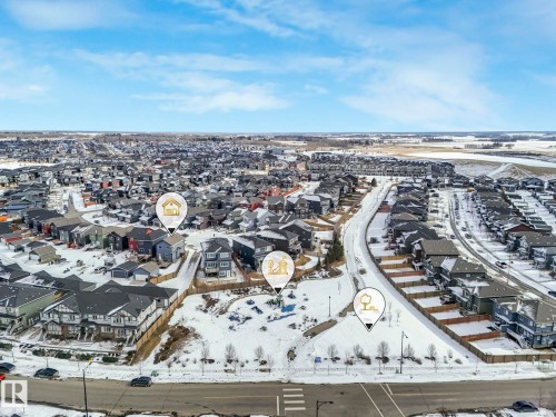 Snowy aerial view with a residential view - 2428 Wonnacott Crest, Edmonton, AB - Outdoor With View