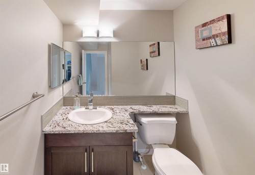 Bathroom featuring vanity and toilet - 8 9535 217 Street, Edmonton, AB - Indoor Photo Showing Bathroom