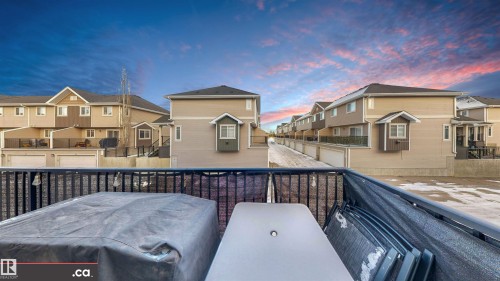 Wooden terrace with a residential view - 8 9535 217 Street, Edmonton, AB - Outdoor
