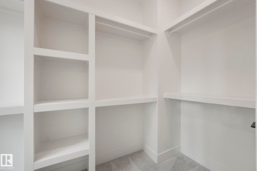 Walk in closet featuring carpet floors - 10965 129 Street, Edmonton, AB - Indoor With Storage