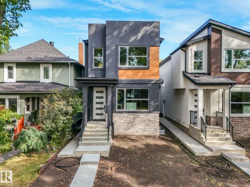 Contemporary house featuring stucco siding and stone siding - 10965 129 Street, Edmonton, AB - Outdoor