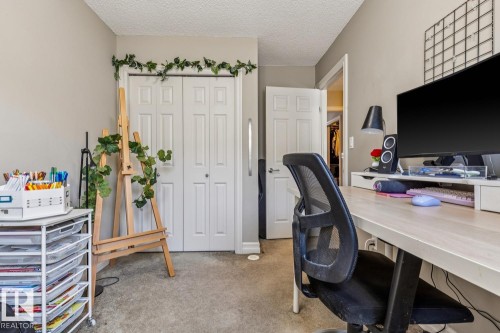 Home office with light carpet and a textured ceiling - 5409 3 Avenue, Edmonton, AB - Indoor Photo Showing Office