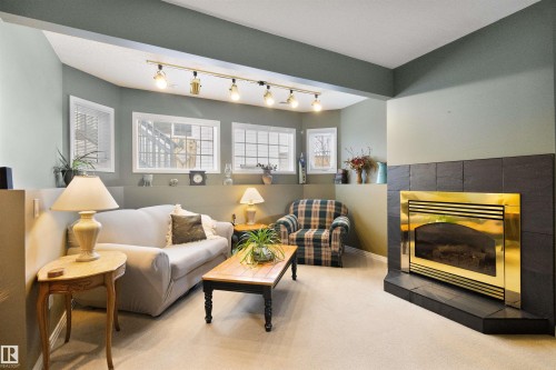5406 45 St, Tofield, AB - Indoor Photo Showing Living Room With Fireplace