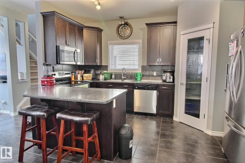 6912 22 Avenue, Edmonton, AB - Indoor Photo Showing Kitchen With Double Sink