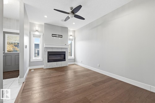 8144 78 Avenue, Edmonton, AB - Indoor Photo Showing Living Room With Fireplace