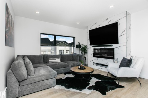 8280 Chappelle Way, Edmonton, AB - Indoor Photo Showing Living Room With Fireplace
