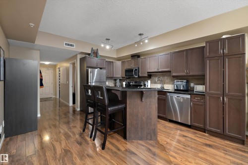 307 10303 111 Street, Edmonton, AB - Indoor Photo Showing Kitchen With Stainless Steel Kitchen