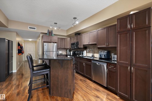 307 10303 111 Street, Edmonton, AB - Indoor Photo Showing Kitchen With Stainless Steel Kitchen