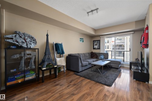 307 10303 111 Street, Edmonton, AB - Indoor Photo Showing Living Room