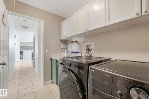 12 Rue Bouchard, Beaumont, AB - Indoor Photo Showing Laundry Room