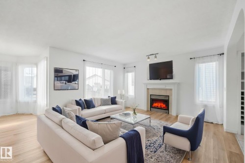 12 Rue Bouchard, Beaumont, AB - Indoor Photo Showing Living Room With Fireplace