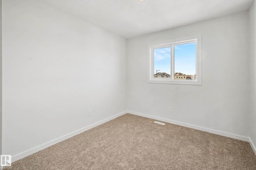 7126 51 Avenue, Beaumont, AB - Indoor Photo Showing Other Room