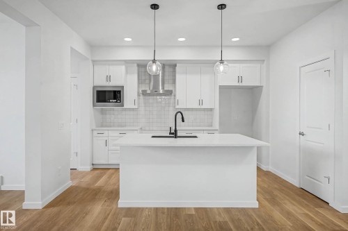 7126 51 Avenue, Beaumont, AB - Indoor Photo Showing Kitchen With Upgraded Kitchen