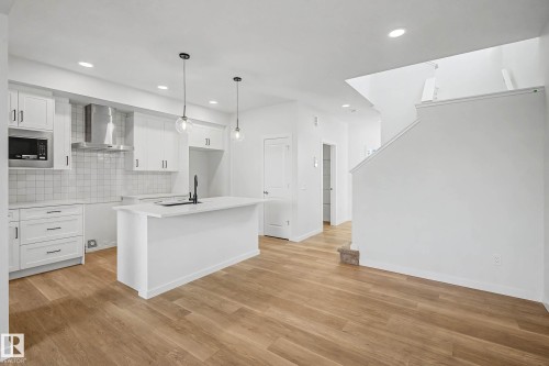 7126 51 Avenue, Beaumont, AB - Indoor Photo Showing Kitchen With Upgraded Kitchen