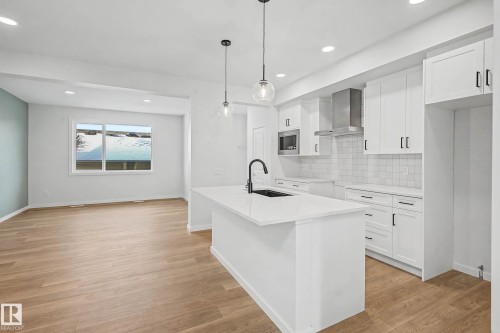 7126 51 Avenue, Beaumont, AB - Indoor Photo Showing Kitchen With Upgraded Kitchen