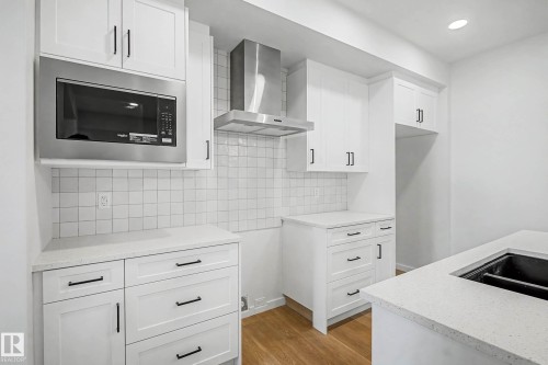 7126 51 Avenue, Beaumont, AB - Indoor Photo Showing Kitchen With Double Sink