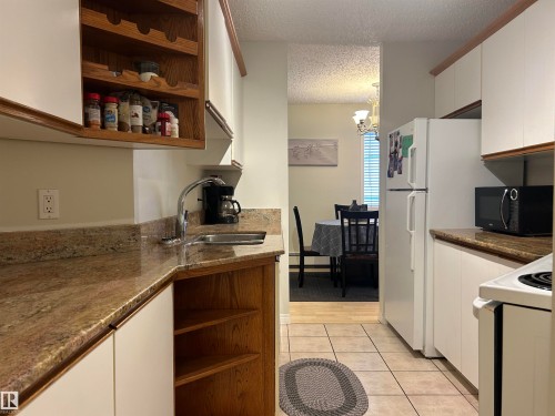 203 6310 101 Avenue, Edmonton, AB - Indoor Photo Showing Kitchen With Double Sink